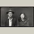 Man in Fedora and Glasses with Wife